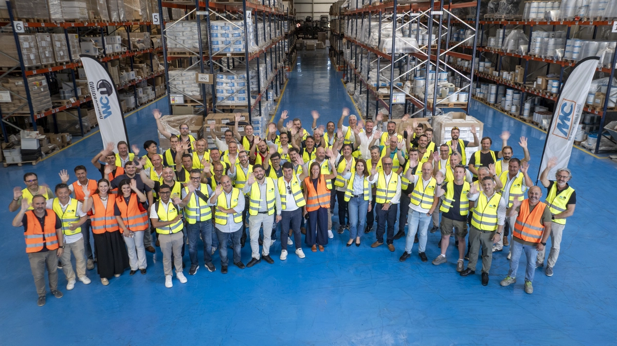 Participants at the MCU event at the MC Spain headquarters warehouse