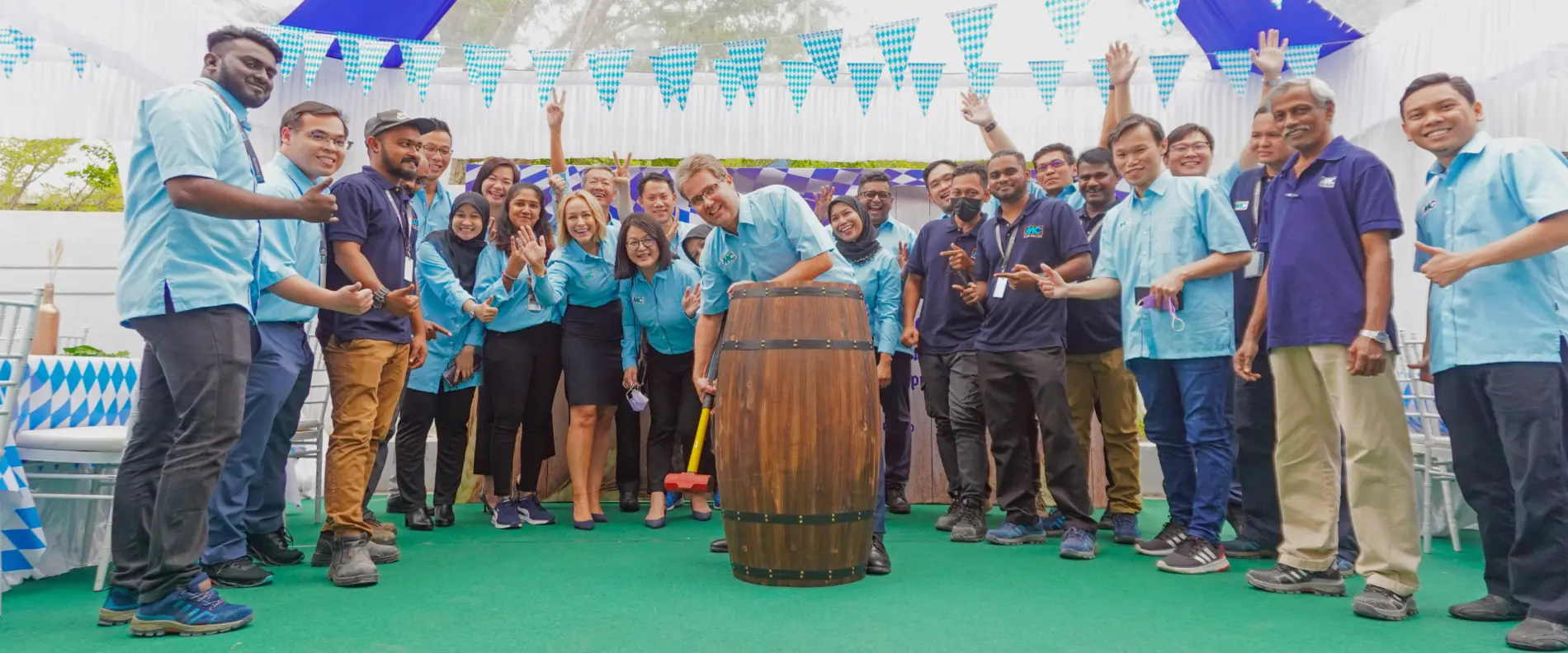 Tapping of the barrel at the grand opening of the new site of  MC-Bauchemie Malaysia
