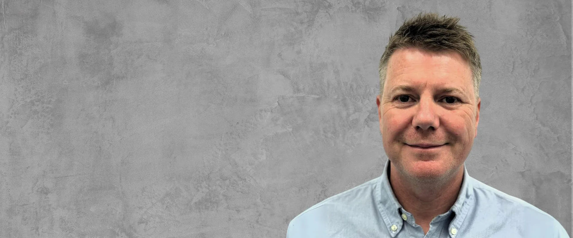 Greg Burton as the Managing Director of MC-UK